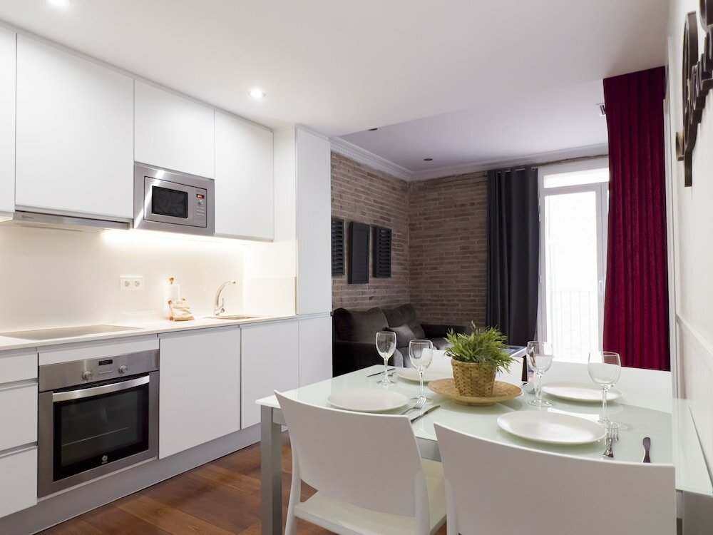 Фото Enjoybcn Gaudi Apartments