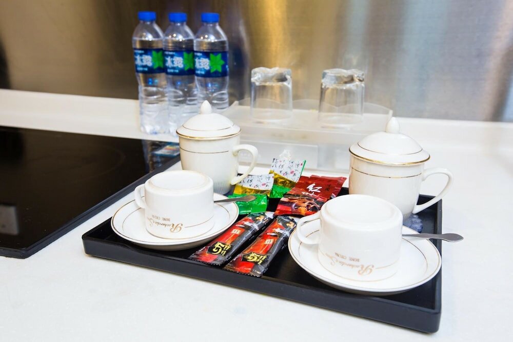 Фото Yoyo International Apartment