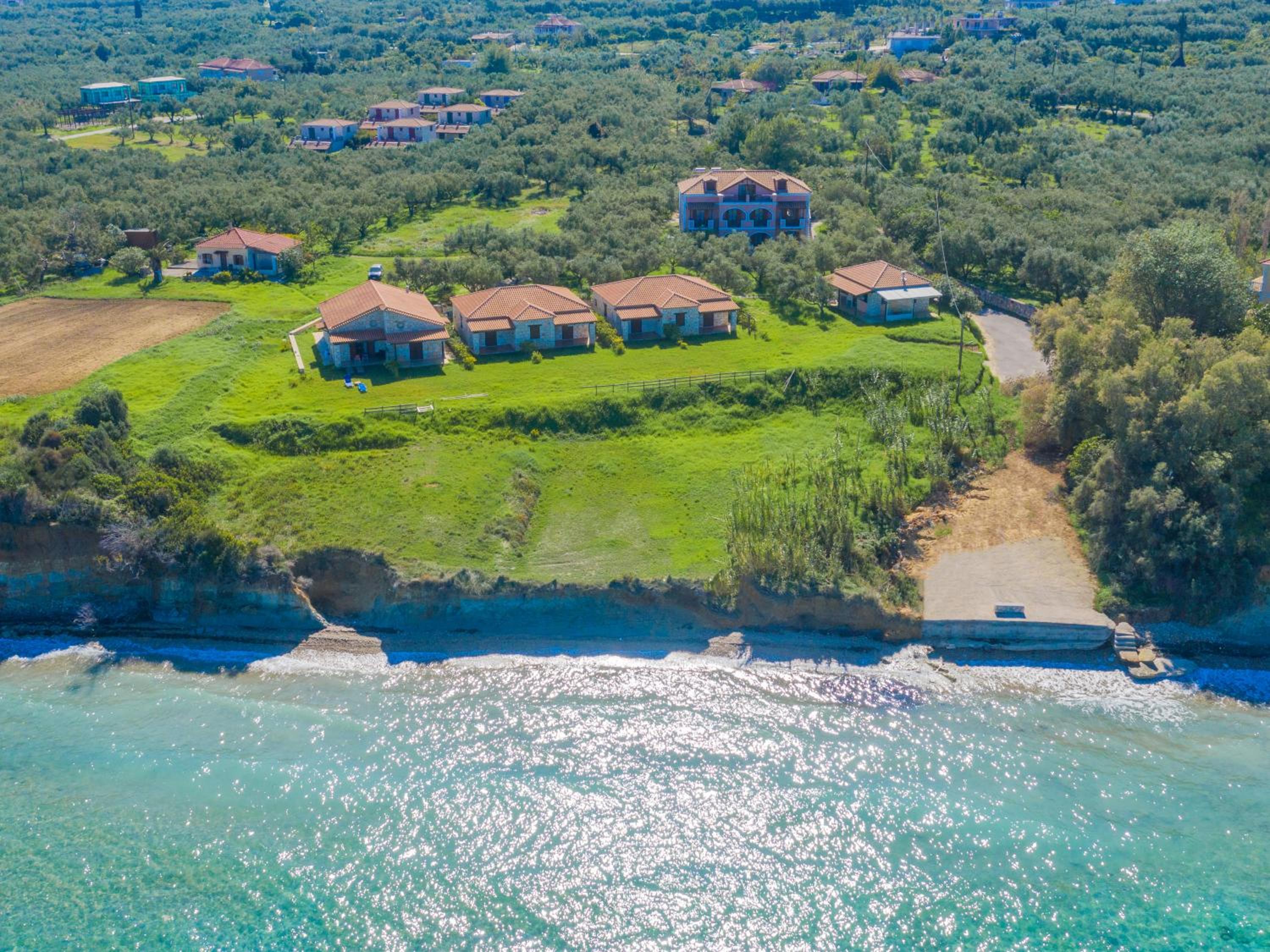 Фото Kavos Psarou Studios and Apartments