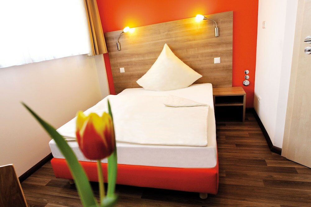 Фото Orange Hotel und Apartments