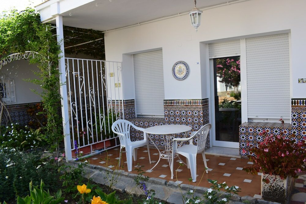 Фото Apartamentos El Jardin