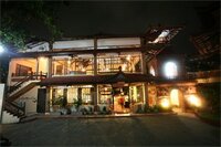 Фото Puri Naga Beachfront Cottages