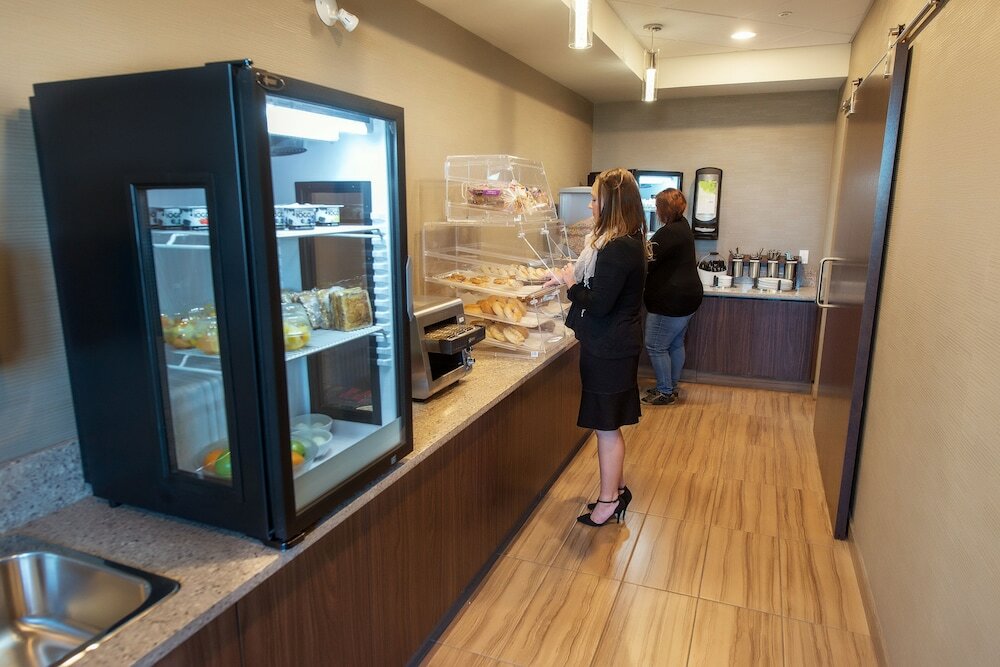 Фото Encore Suites by Service Plus Inns