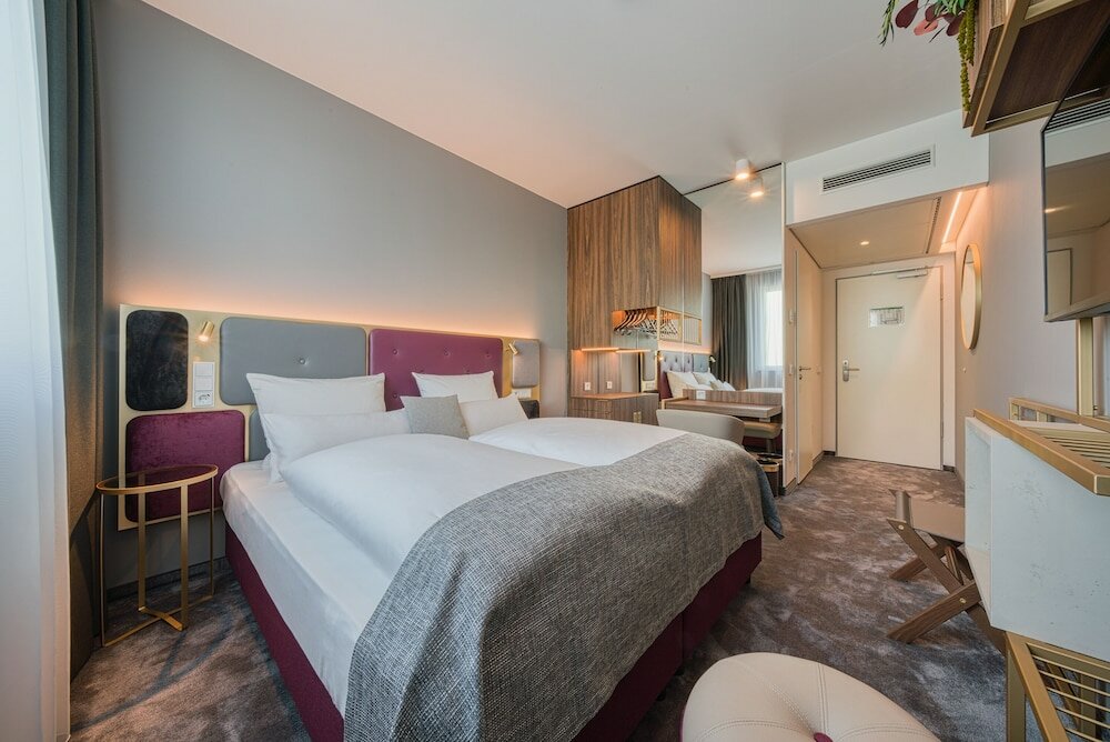 Фото Plaza Premium Muenchen