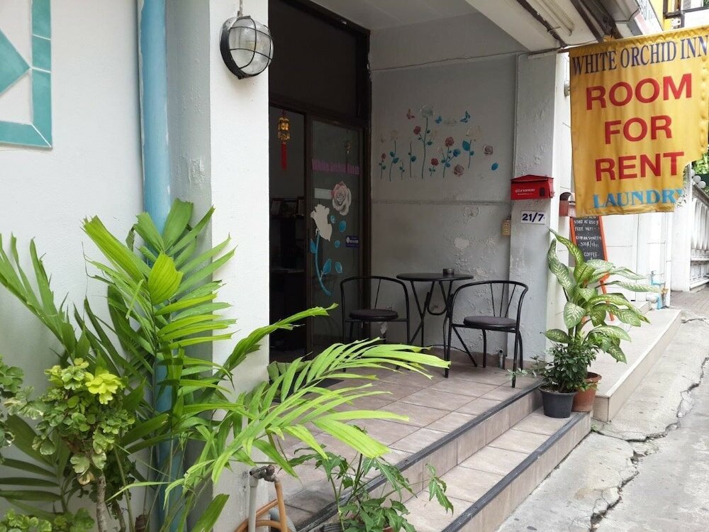 Фото White Orchid Inn
