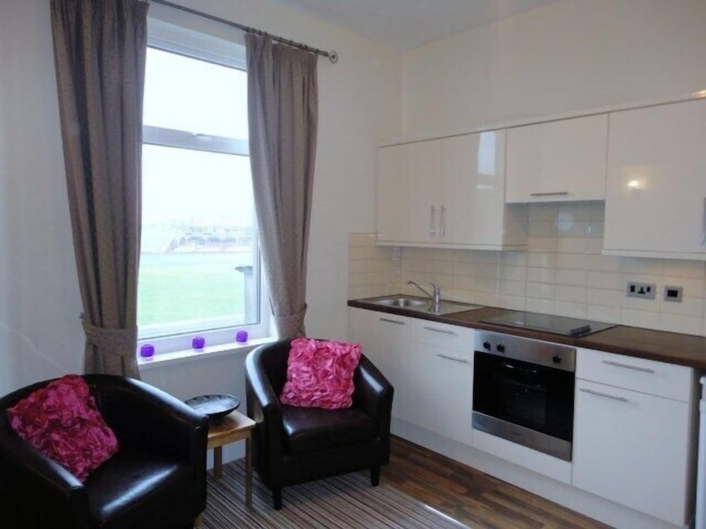 Фото 45 The Square Holiday Apartments