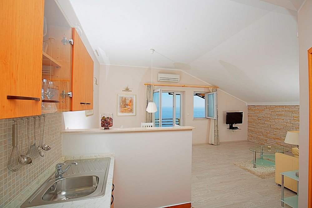 Фото Light Blue Apartment