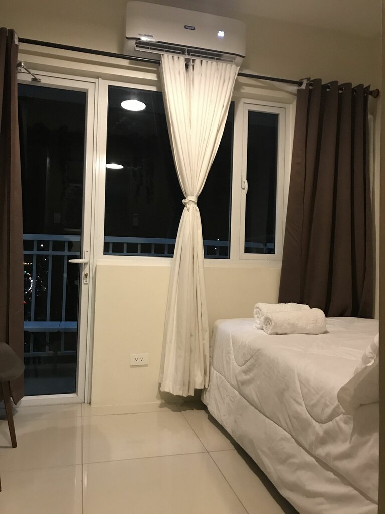 Hotel Breeze Residences Condo, Earth, photo