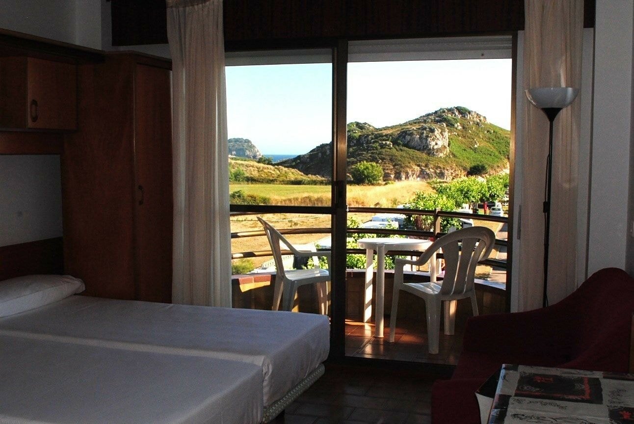 Фото Apartamentos Turisticos Suaces