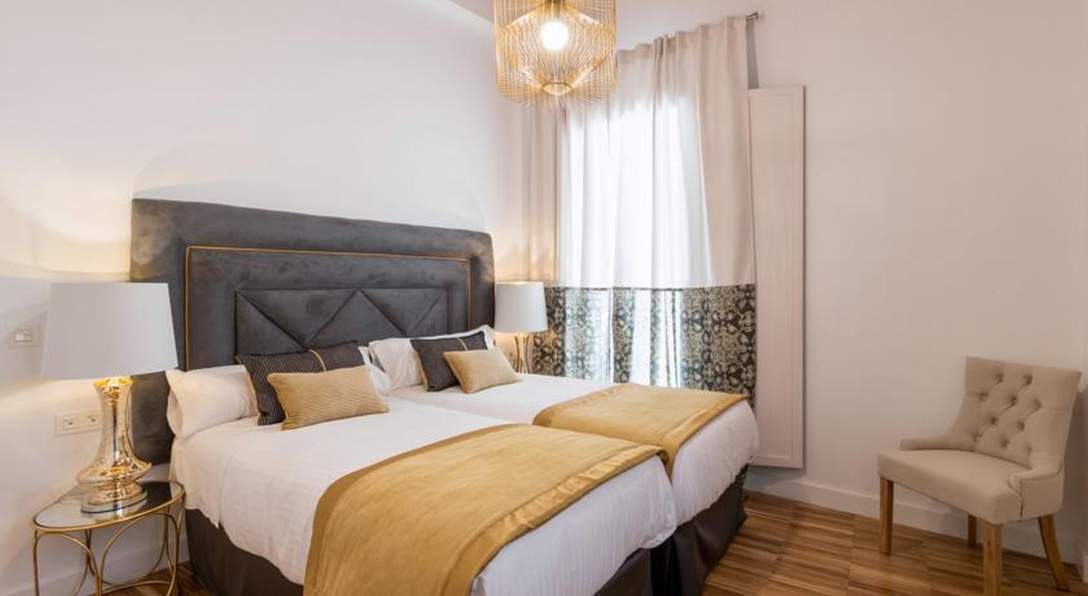 Фото Oro Del Darro Suites