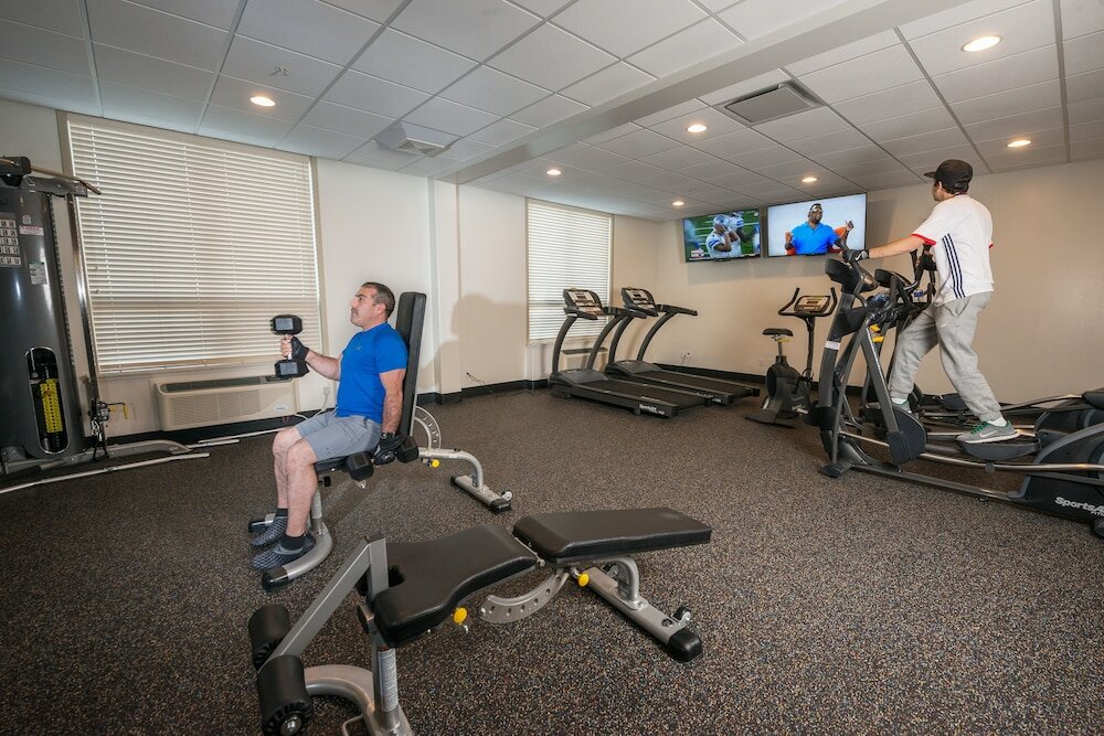 Фото Encore Suites by Service Plus Inns