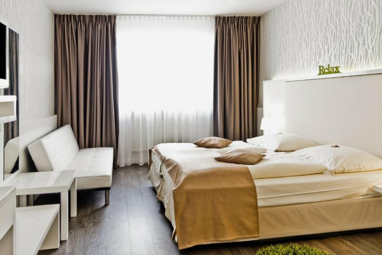 Фото Qu Hotel Augsburg