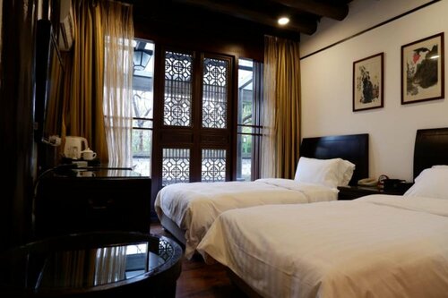 Гостиница Hangzhou Xixi Bieyuan Resort Hotel в Ханчжоу