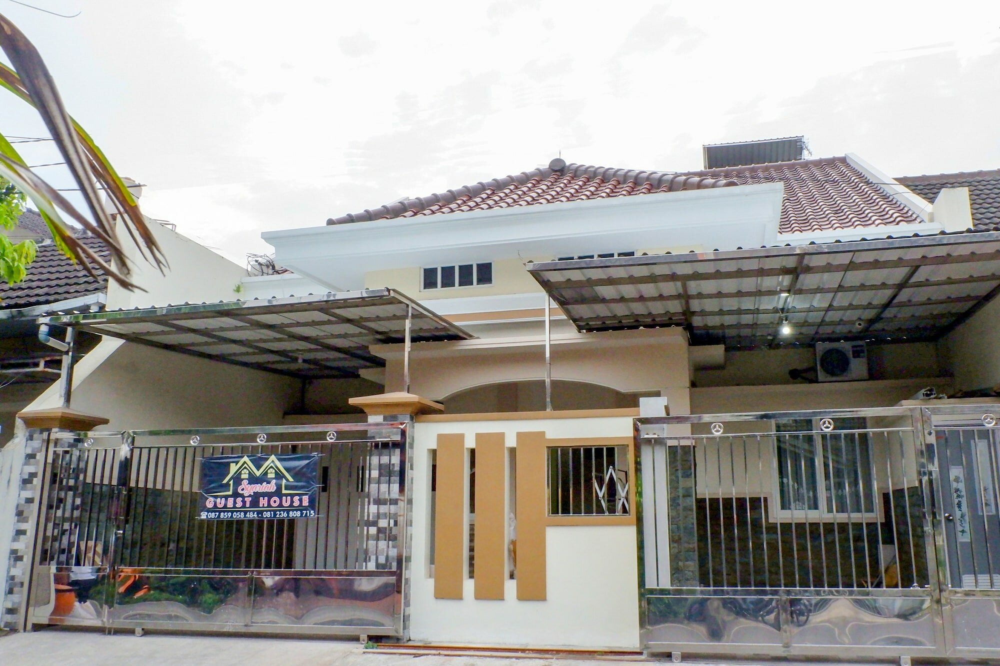 Фото Oyo 314 Emas 23 Guest House Syariah