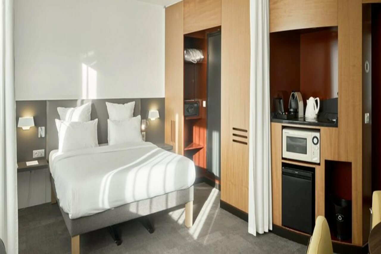 Фото Novotel Suites Paris Nord 18ème Hotel