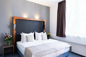 Гостиница Novum Hotel Aviva Leipzig Neue Messe
