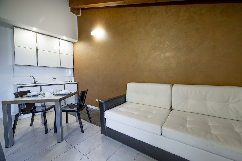 Фото Atmosphere Suite Hotel