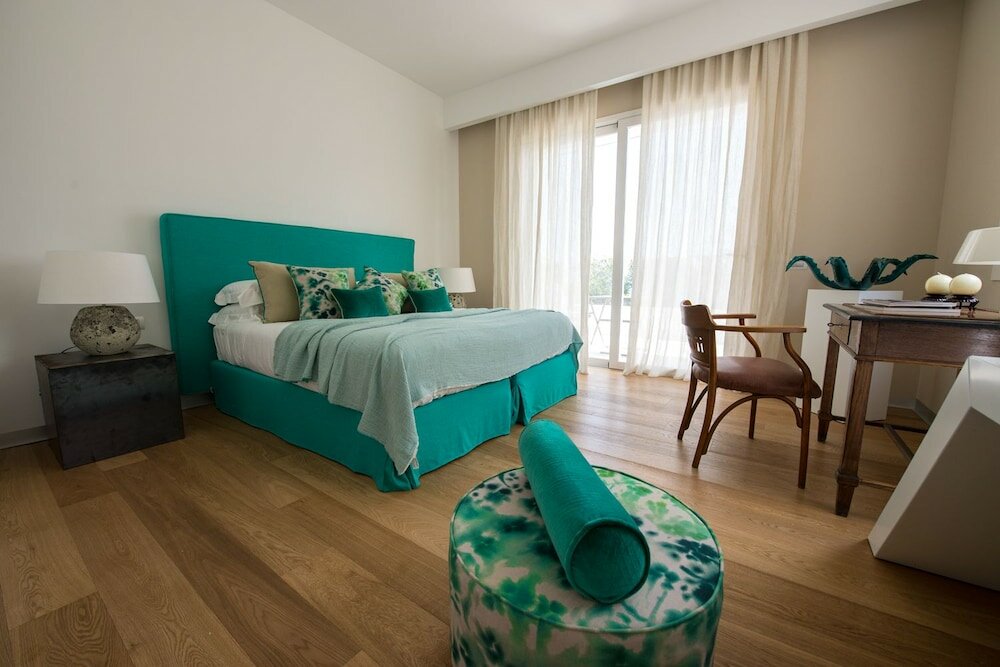 Фото Unìco Boutique Hotel d'Arte