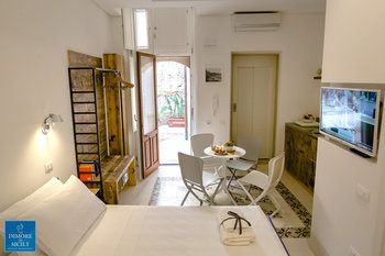 Фото Dione Apartments Ortigia