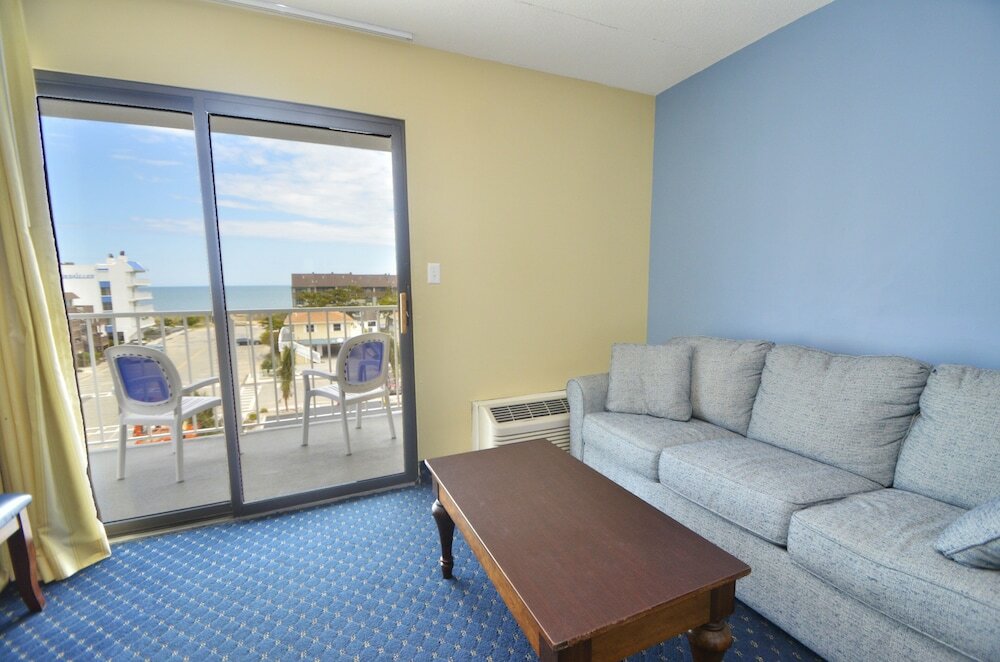 Фото Coastal Palms Inn & Suites