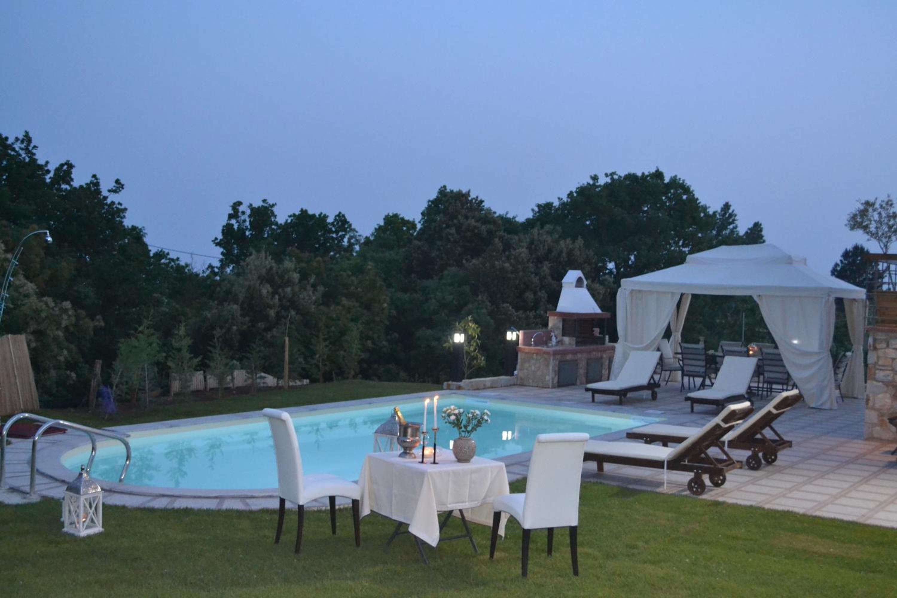 Фото Evmorfes Villas