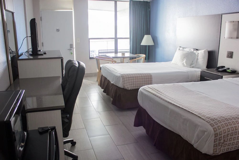 Фото Atlantic Ocean Palm Inn