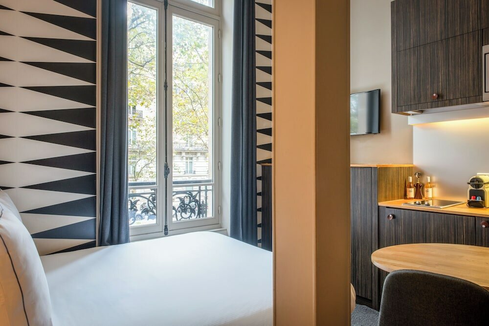 Фото Suites and Hotel Helzear Champs Elysees