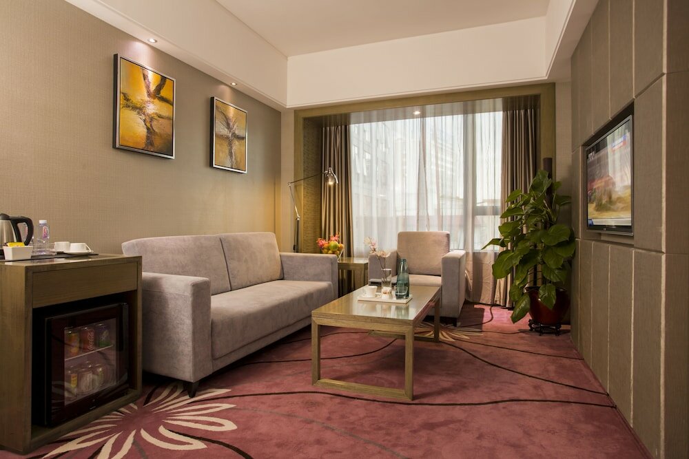 Фото La Perle International Hotel