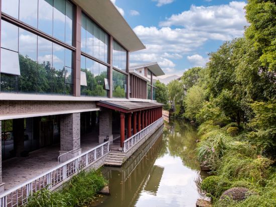 Фото Sheraton Grand Hangzhou Wetland Park Resort