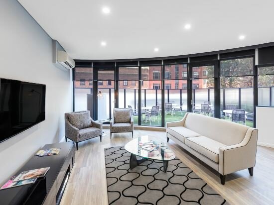 Фото Meriton Suites Kent Street, Sydney