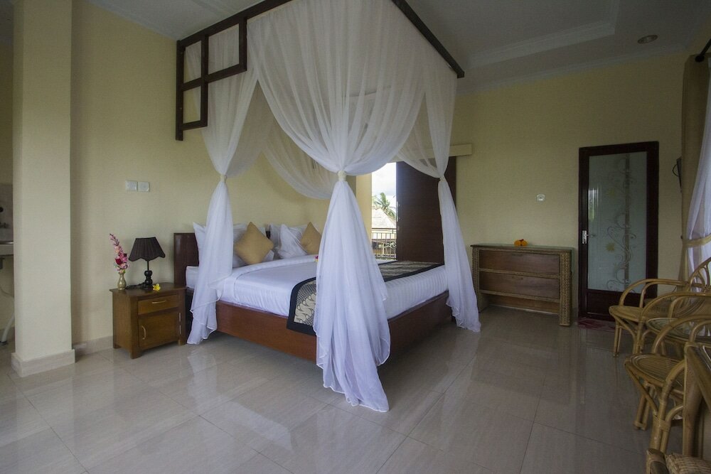 Фото Purnama Guest House