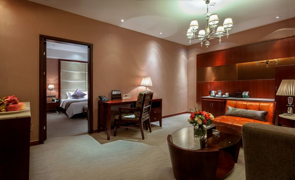 Фото Wuhan Tianchimel Hotel