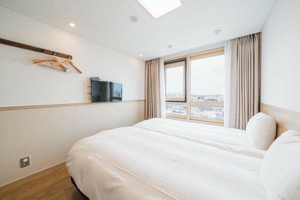 Фото Kenny Stay Jeju Seoguipo-Hotel Kenny