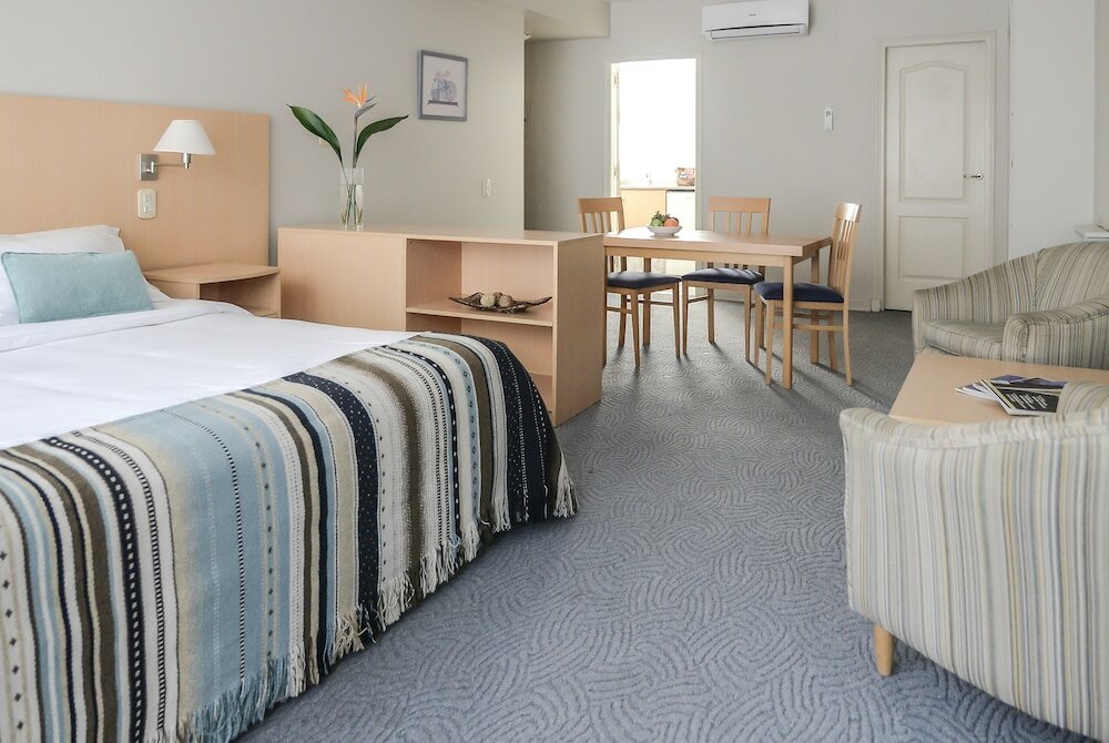 Фото Portal Plaza Suites