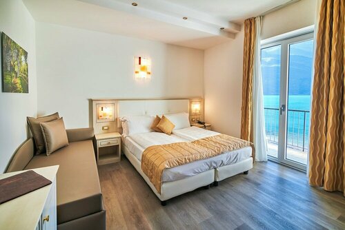 Внешний вид отеля Hotel Lido Blu Surf & Bike в Наго-Торболях, фото 4