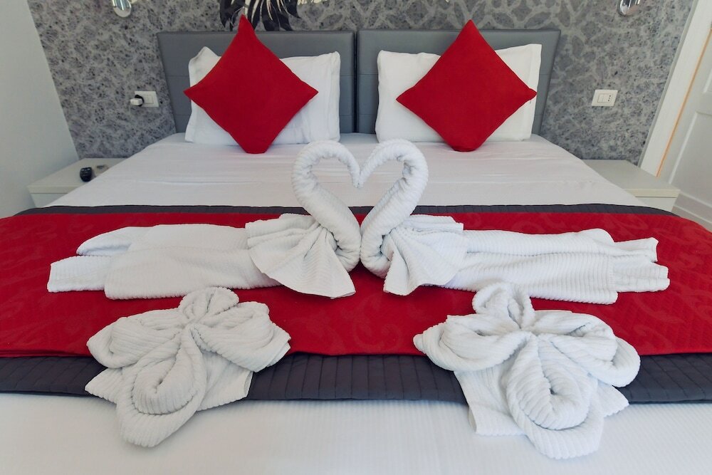 Фото Suites Farnese Design Hotel