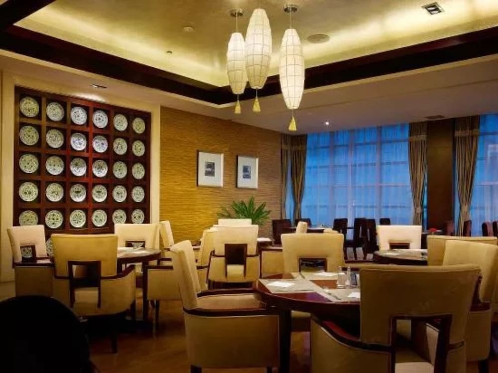 Фото Grand Soluxe International Hotel Xi'an