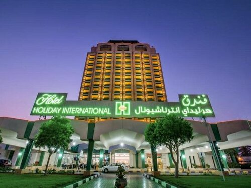 Гостиница Hotel Holiday International в Шардже