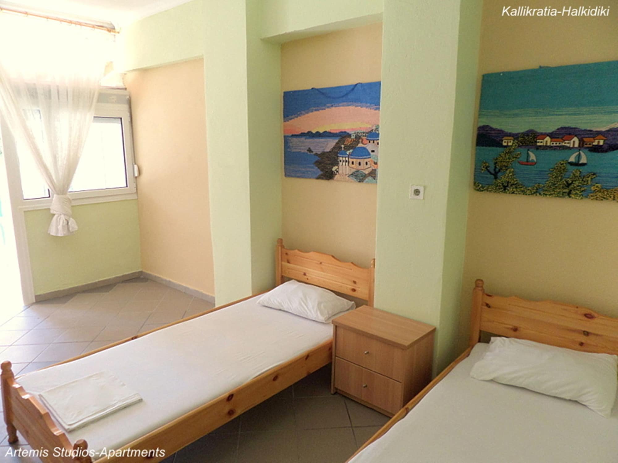 Фото Artemis Studios & Apartments