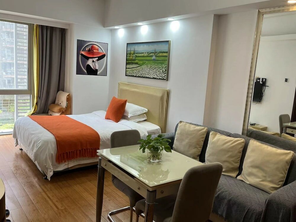 Фото Guangzhou Damei Apartment