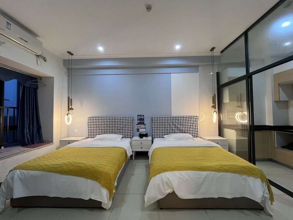 Фото Guangzhou Yi Long International Apartment