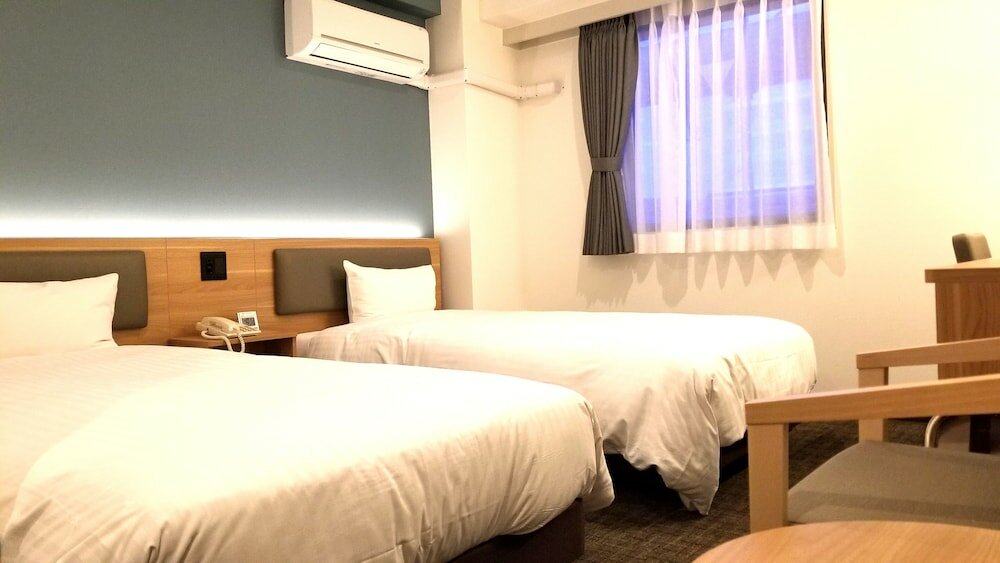 Фото Kochi Sunrise Hotel