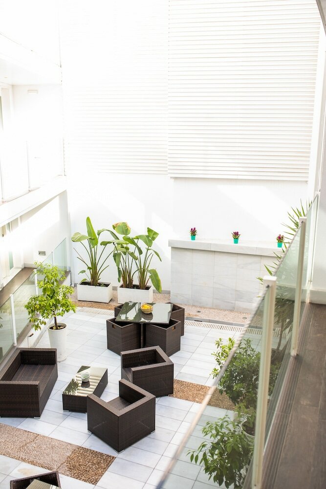 Фото Hotel La Boutique Puerta Osario