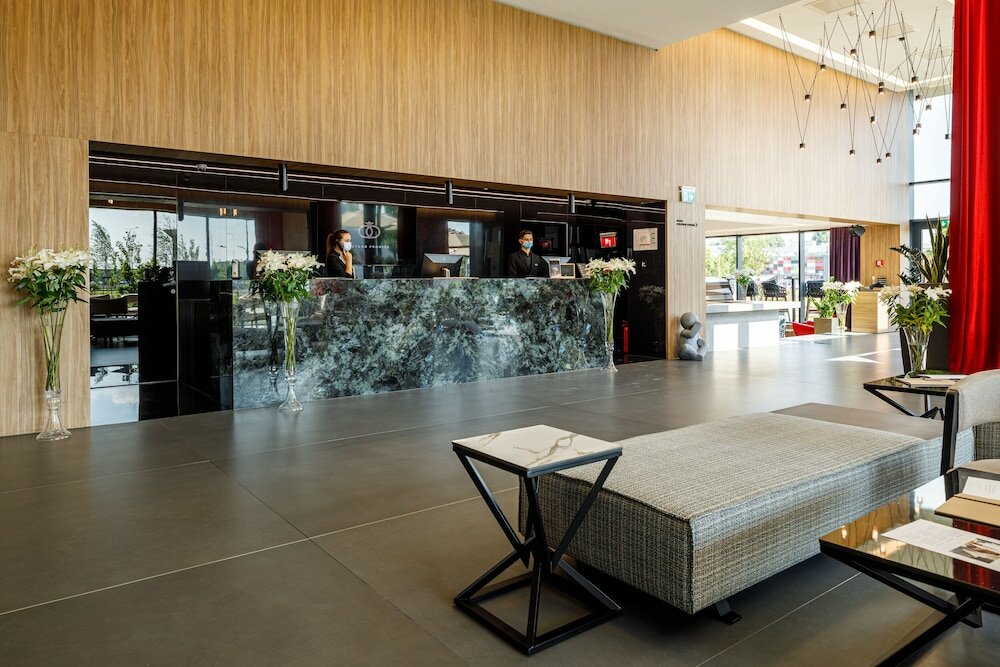 Фото Qosmo Brasov Hotel