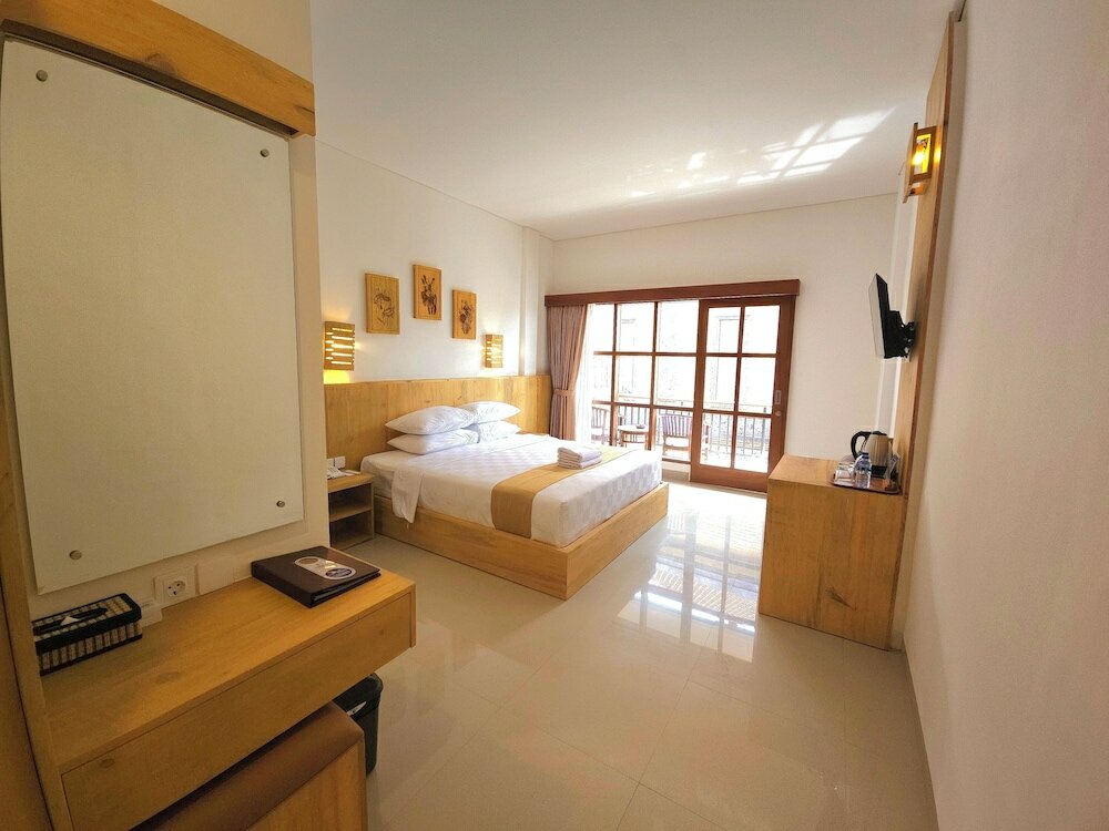 Фото Satriya Cottages