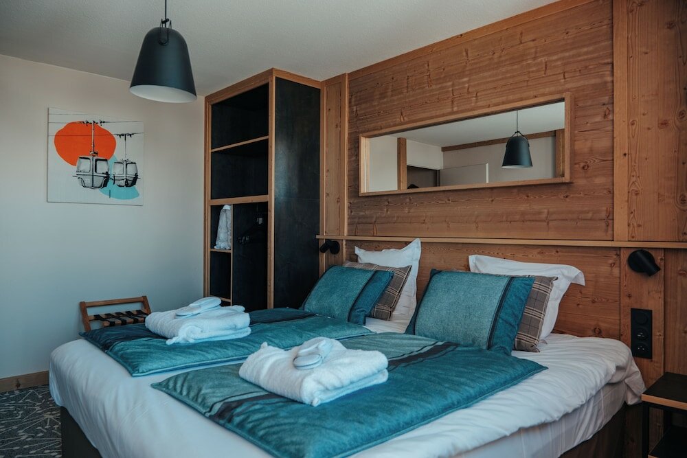 Фото Hôtel l'Eden des Cimes - Vacances Bleues - Belle Plagne 2100