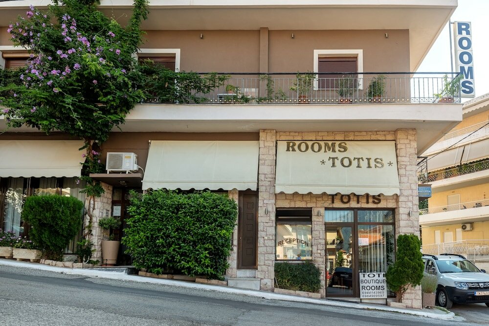 Фото Toti Boutique Rooms