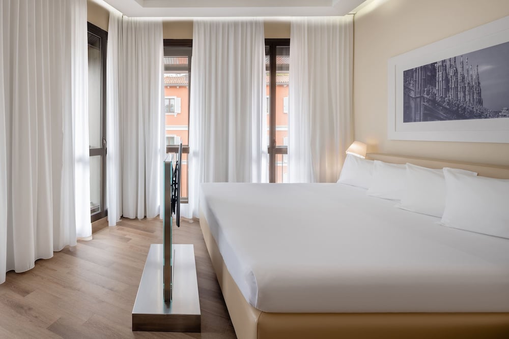 Фото UNAHOTELS Cusani Milano