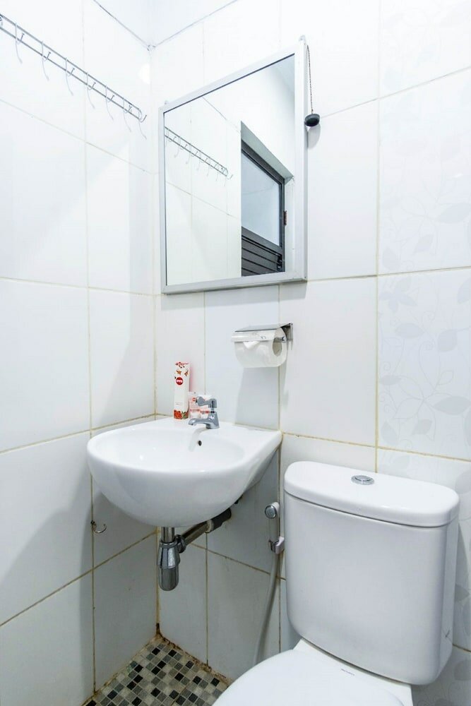 Фото Oyo 283 Helvetia Residence