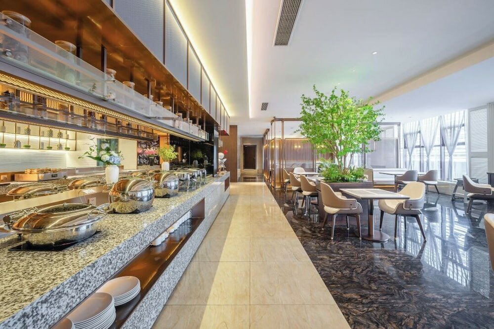 Фото Shanghai Maixinge International Hotel